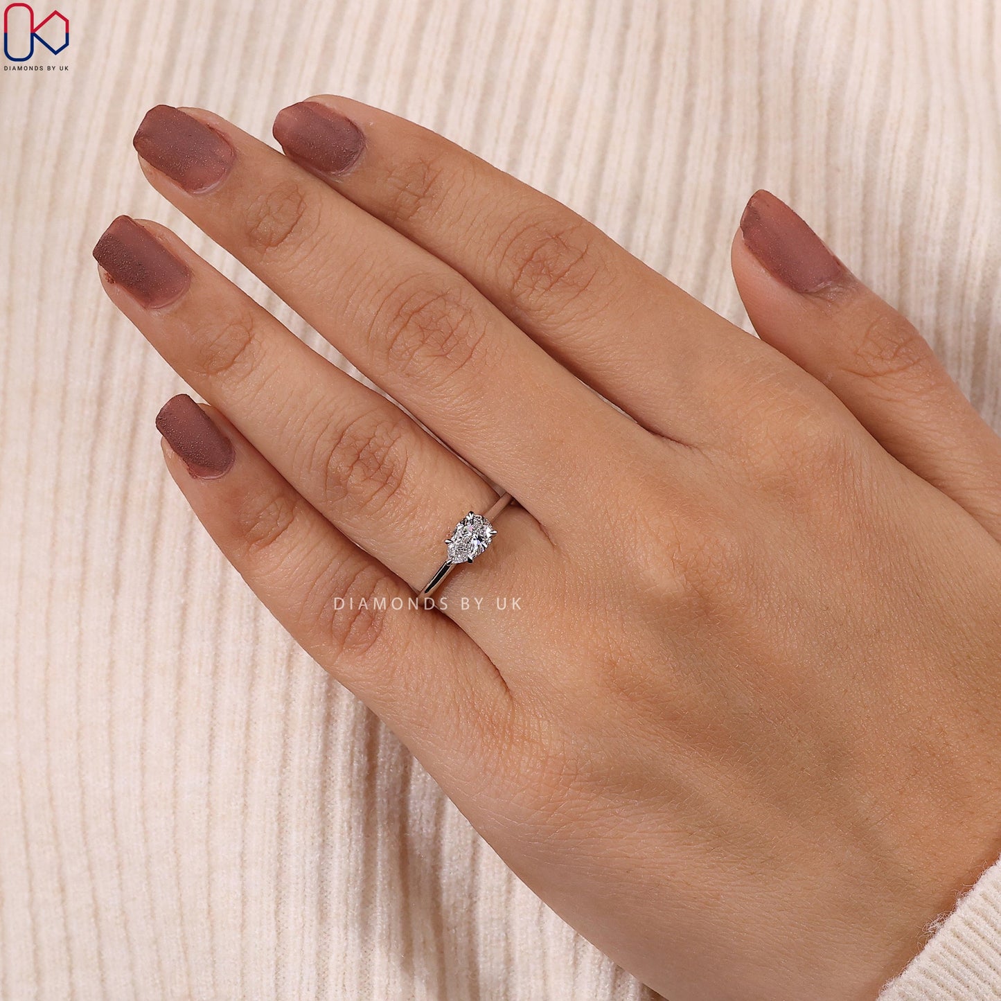 Pear diamond East West Diamond Ring