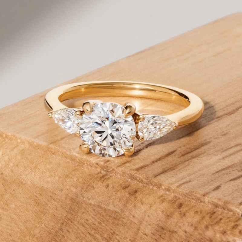 Solarii Moissanite 1.0ct Round Cut Sterling Silver Three Stone Engagement Ring