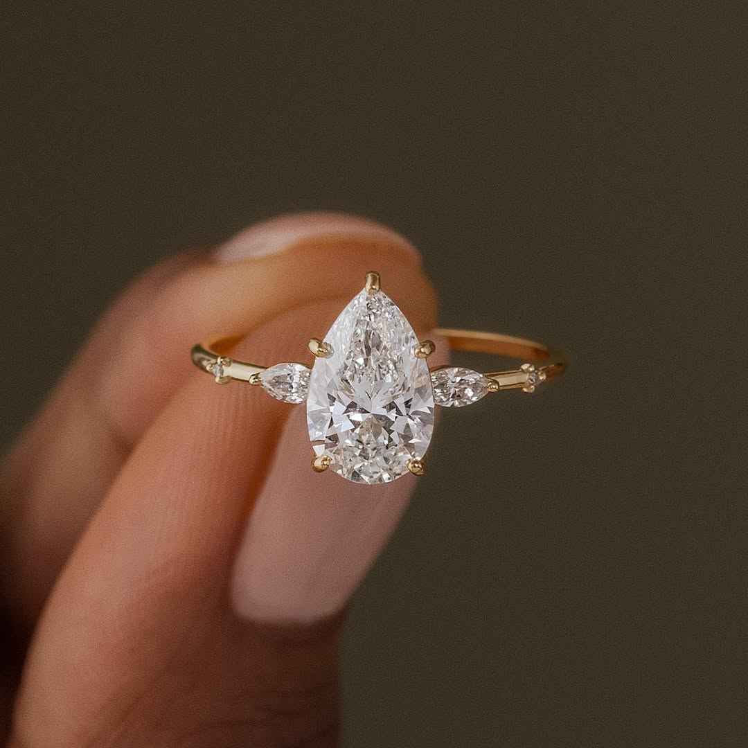 Solarii Moissanite 1.0ct Pear Cut 925 Sterling Silver Engagement Ring
