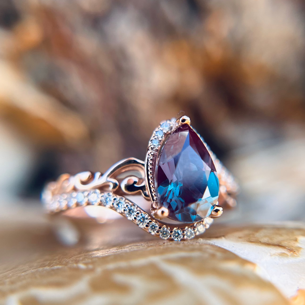 "Scarlet" - Pear Cut Lab-Grown Alexandrite Engagement Ring With Diamond Accents