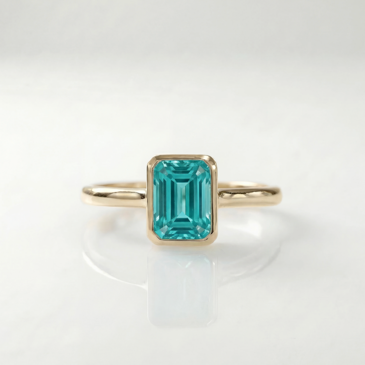 The Classic Bezel Ring | Lab-Grown Paraiba Garnet