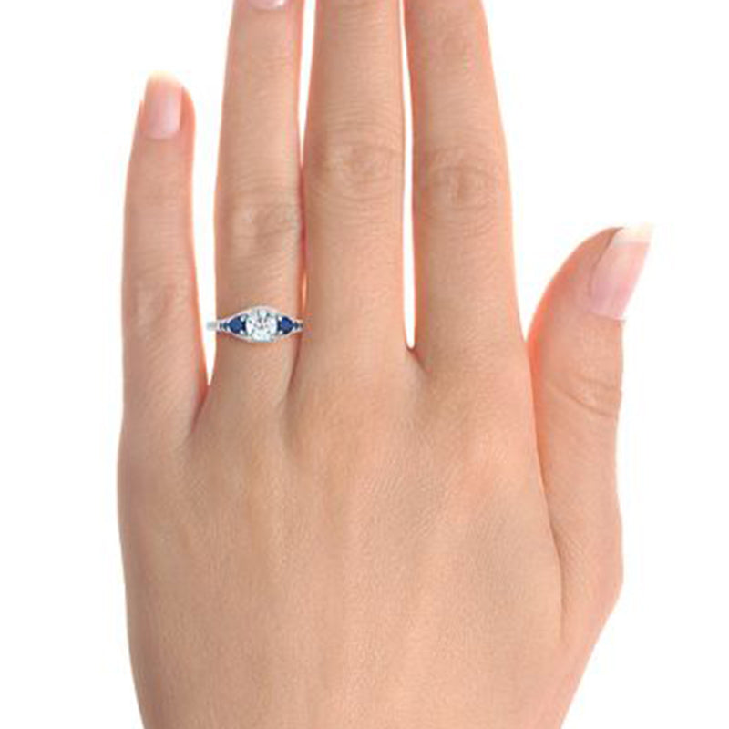 Seven Stone Moissanite And Blue Sapphire Twisted Rope Engagement Ring
