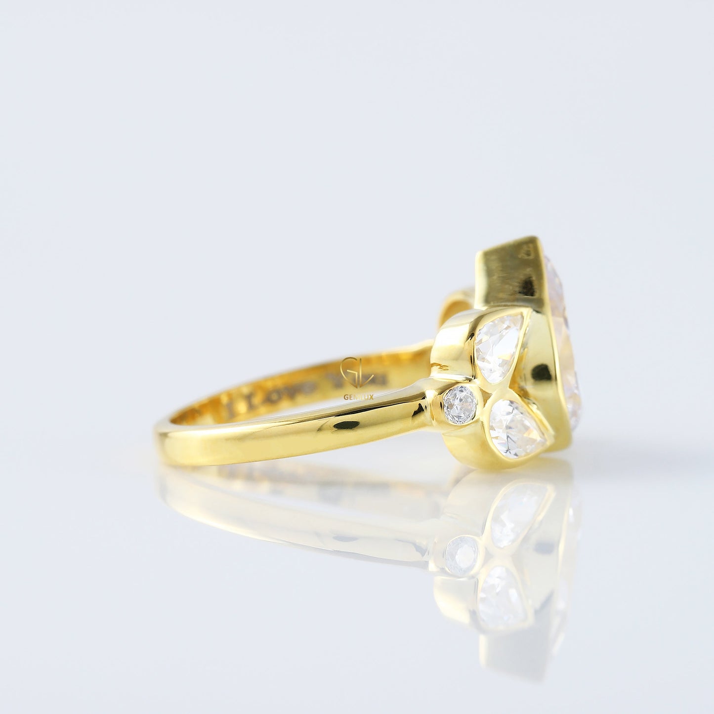 Seven Stone Pear Cut Moissanite Bezel Set Yellow Gold Ring