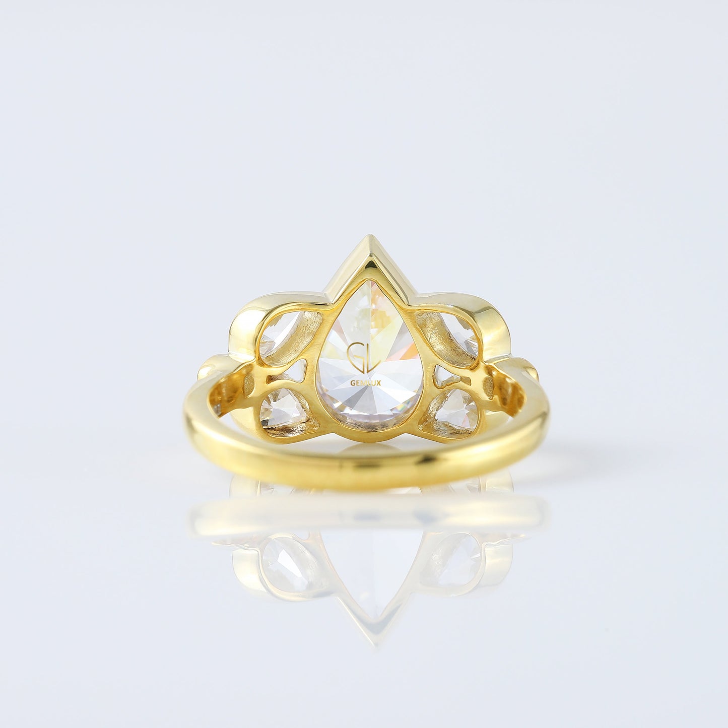 Seven Stone Pear Cut Moissanite Bezel Set Yellow Gold Ring