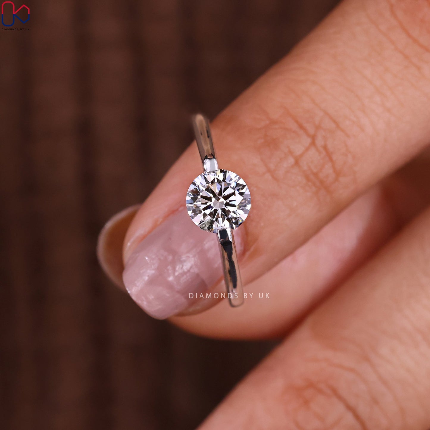 Round Solitaire Engagement Ring In White Gold