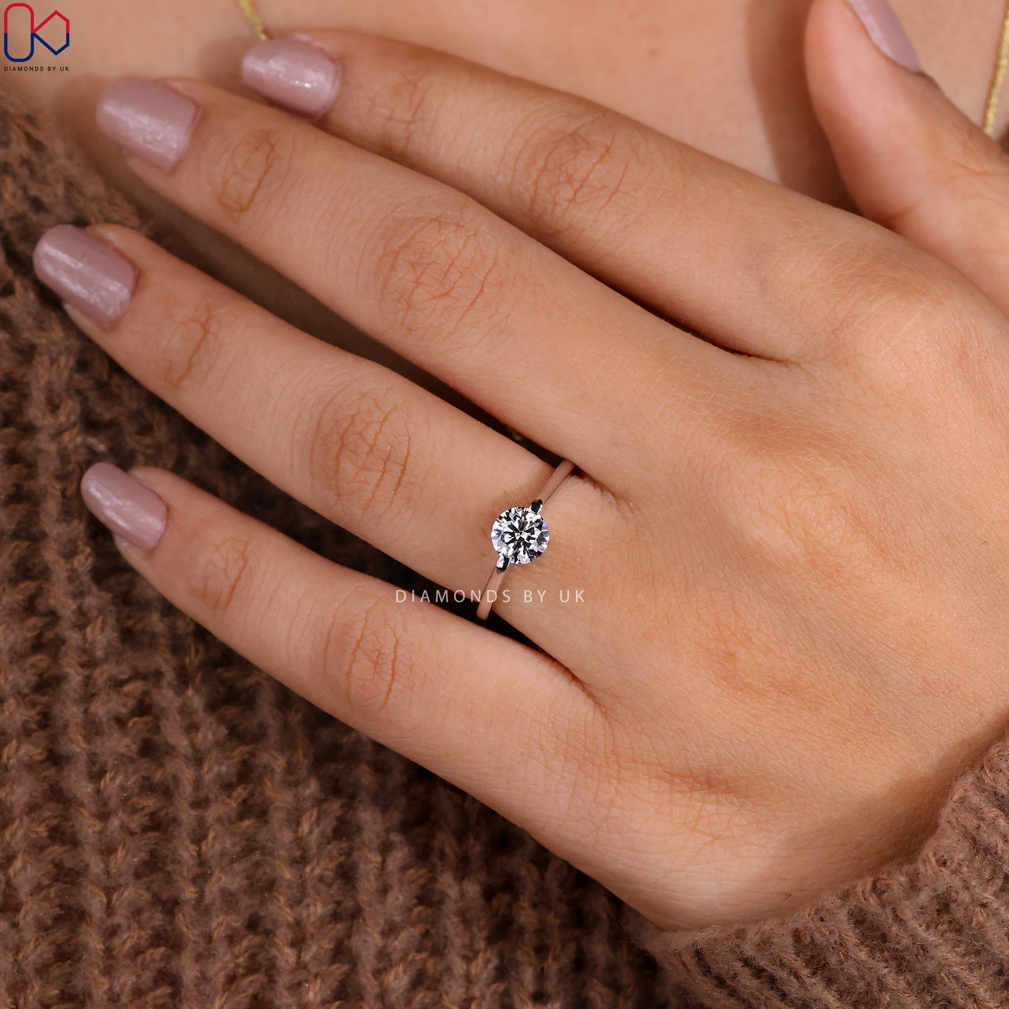 Round Solitaire Engagement Ring In White Gold