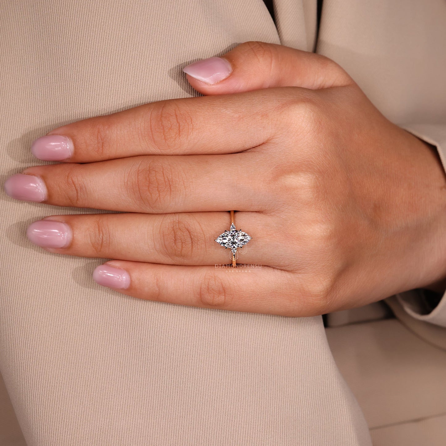 Marquise and Pear Cut Three Stone Engagement Ring