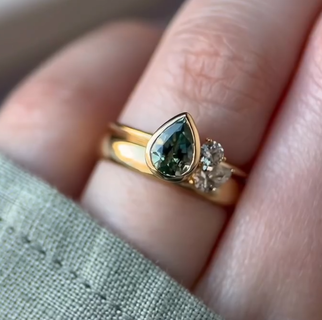 Unique Bezel Set Pear Cut Green Sapphire Ring Set In Sterling Silver