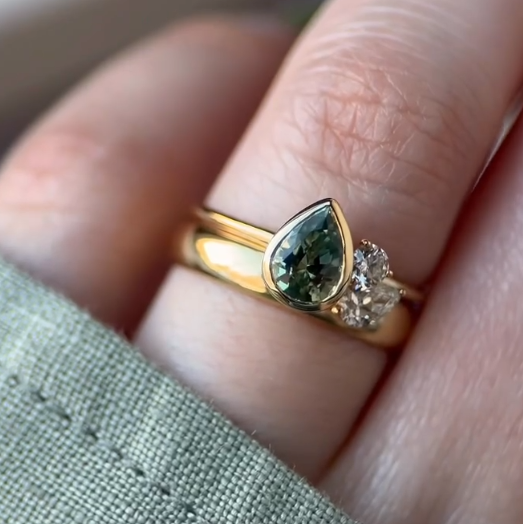 Unique Bezel Set Pear Cut Green Sapphire Ring Set In Sterling Silver
