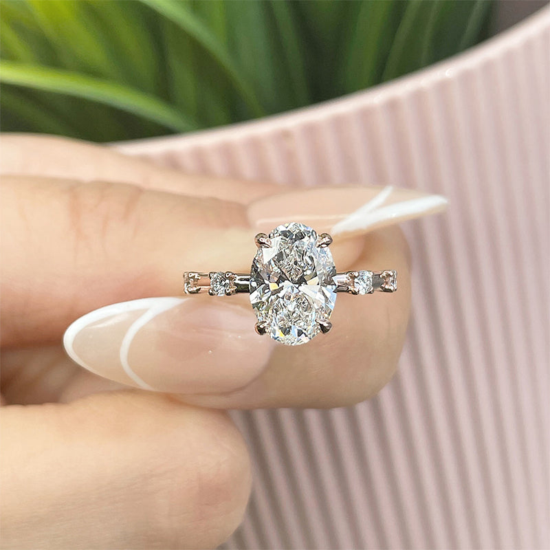 Hidden Halo Oval Moissanite Side Stone Engagement Ring