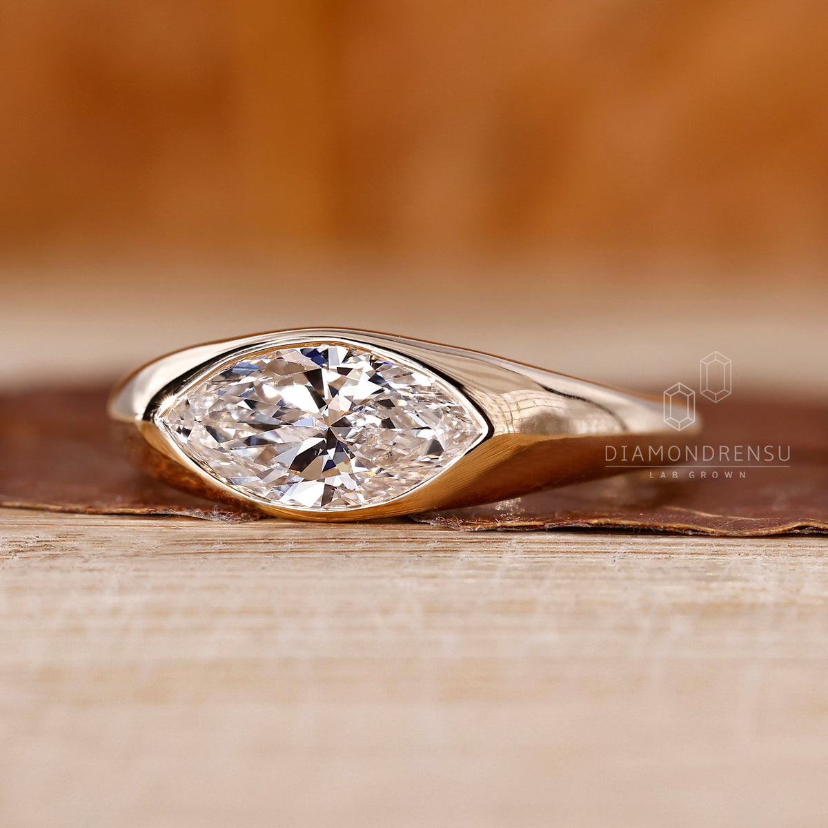 Marquise Cut Engagement Ring in Gypsy Setting