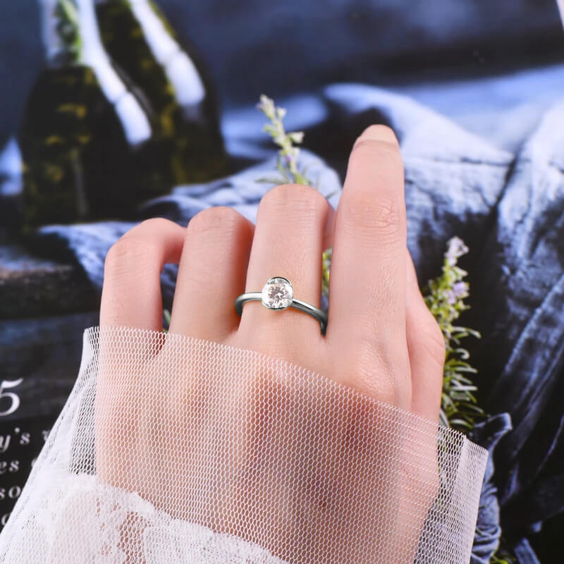 Solitaire Vertical Half Bezel Round Moissanite Engagement Ring