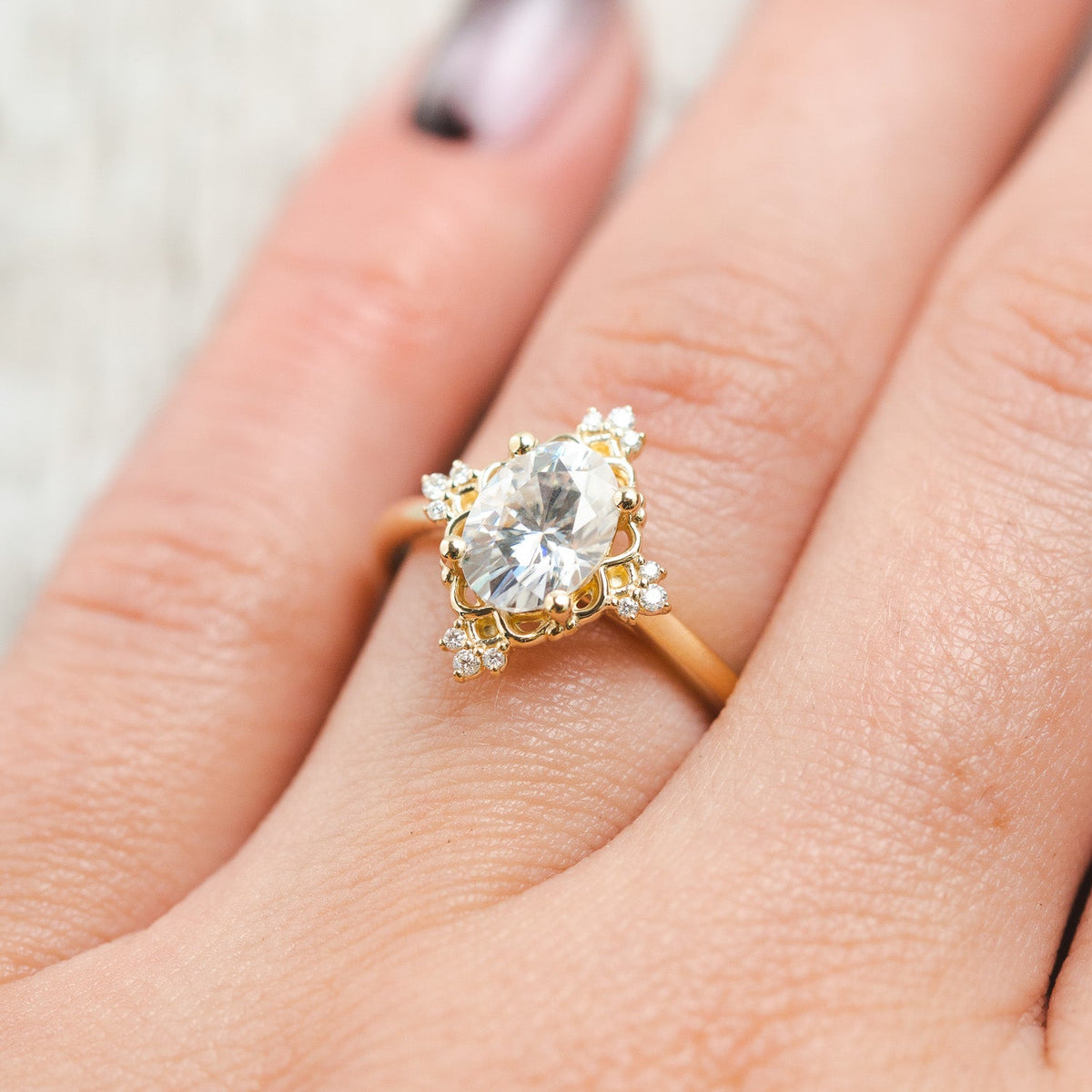 "Treva" - Oval Moissanite Engagement Ring With Diamond Accents & "Melody" Tracer