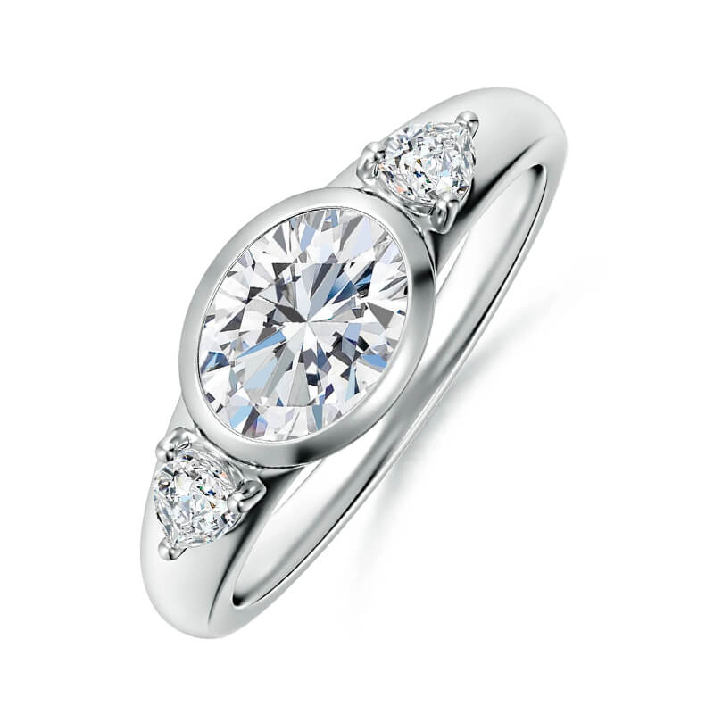 Three-Stone East-West Bezel Oval Moissanite and Pear Sapphire Engagement Ring