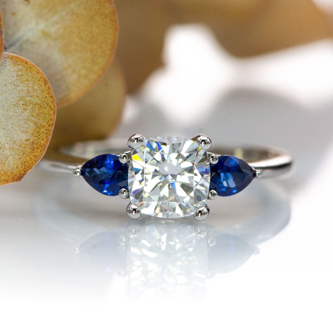 Tressa Bridal Set- Three Stone Cushion Moissanite & Pear Blue Sapphire Engagement Ring & Cecilia Band