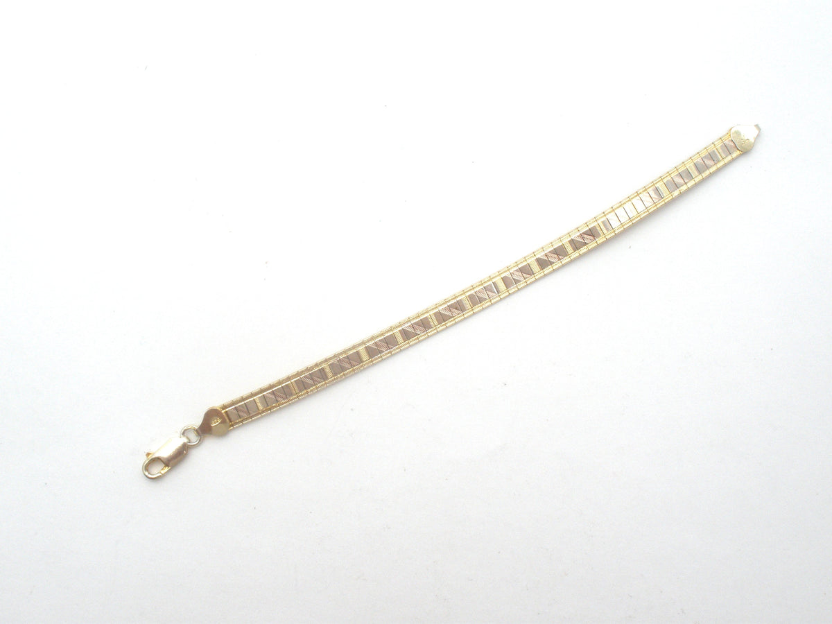 Tri-Gold Over Sterling Silver Flexible Bangle Bracelet