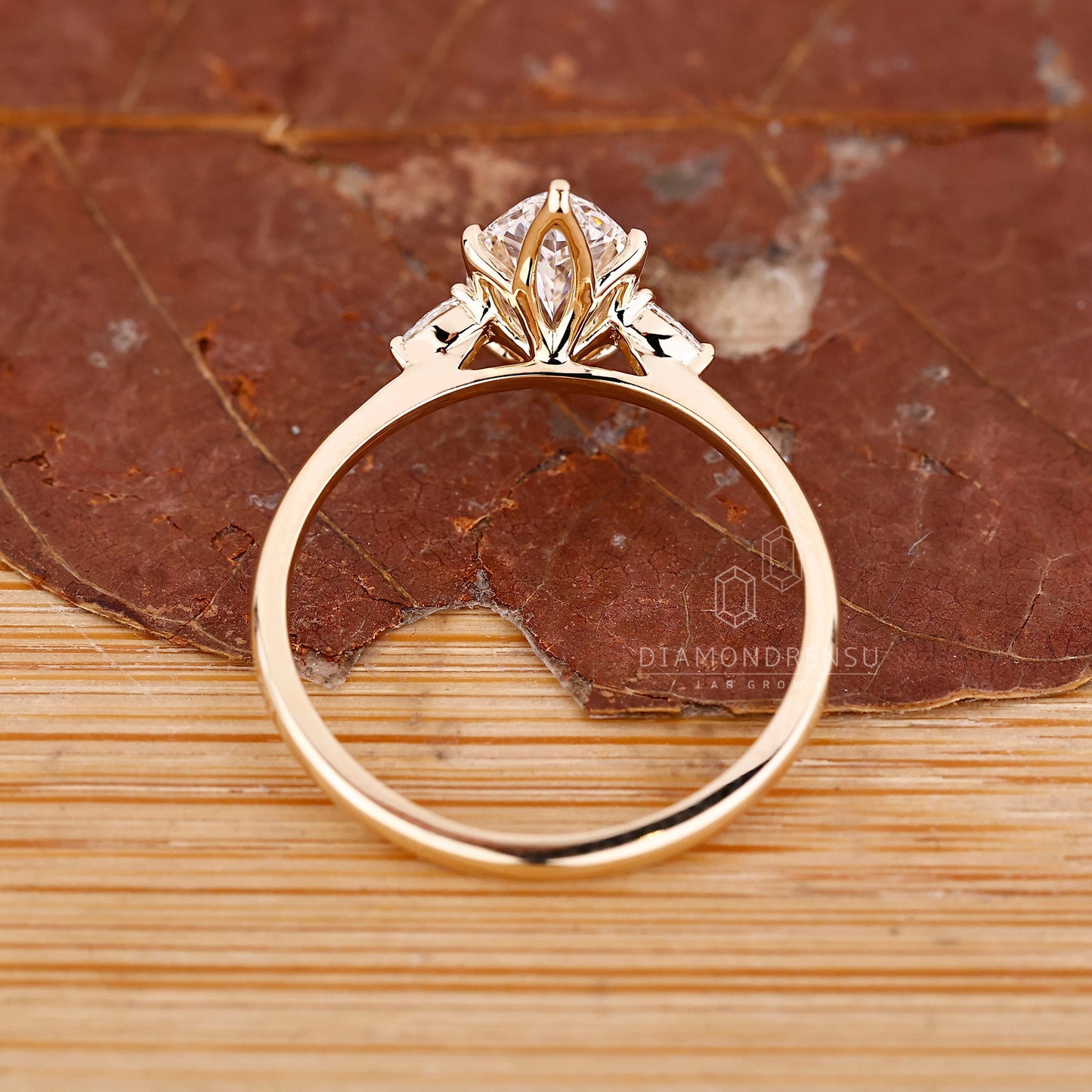 Marquise and Pear Cut Three Stone Engagement Ring