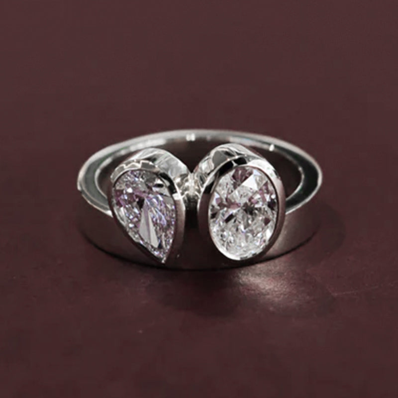 Two Stone Bezel Oval And Pear Moissanite Wide Shank Engagement Ring