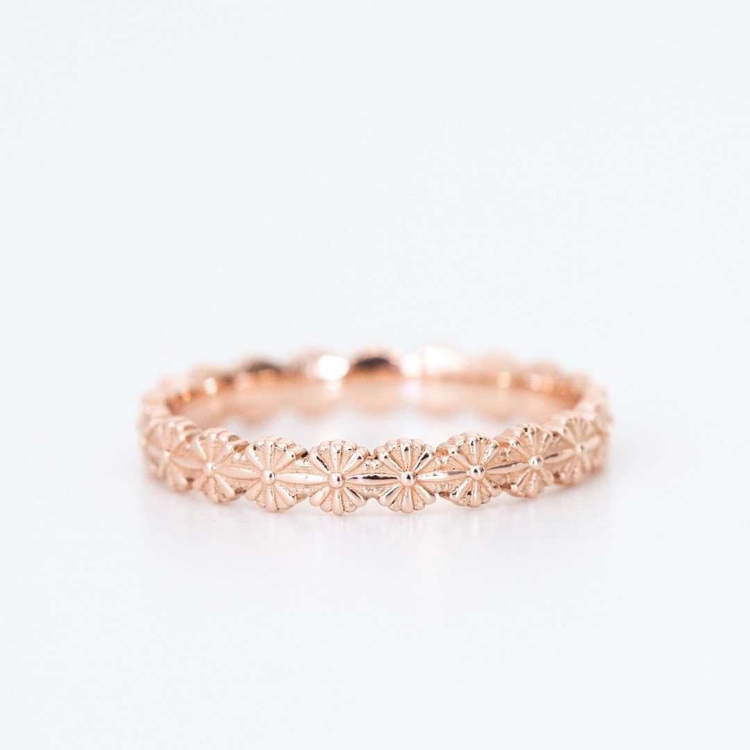 Daisy eternity wedding ring