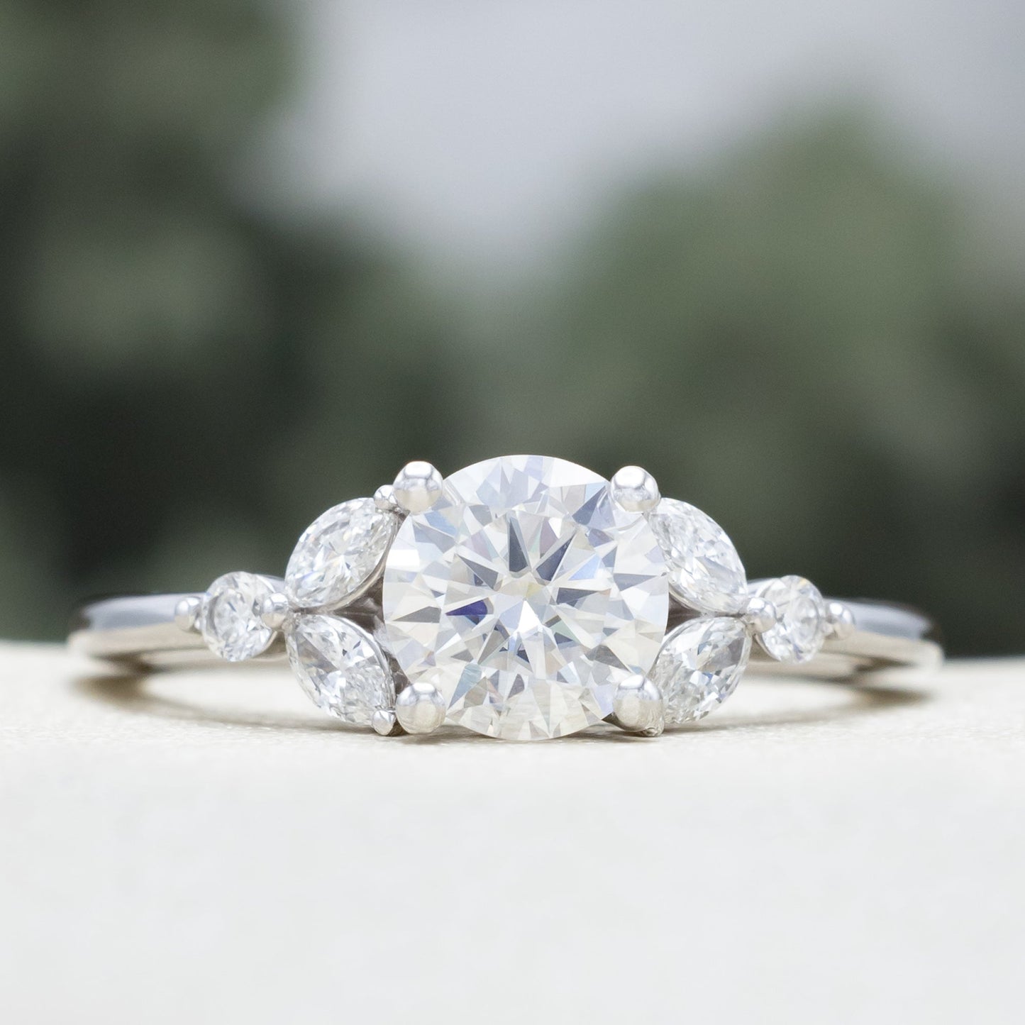 "Blossom" - Round Cut Moissanite Engagement Ring With Diamond Accents