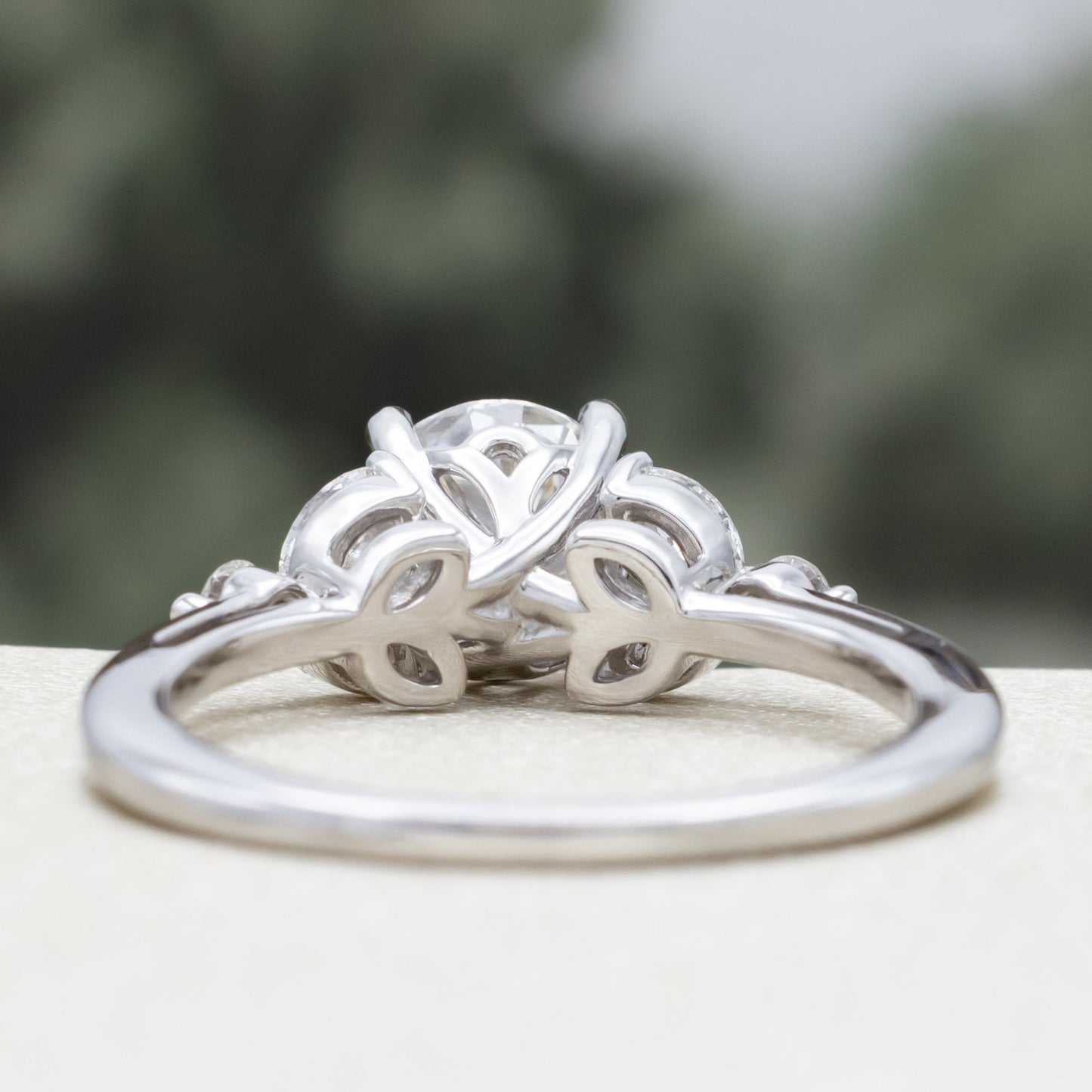 "Blossom" - Round Cut Moissanite Engagement Ring With Diamond Accents