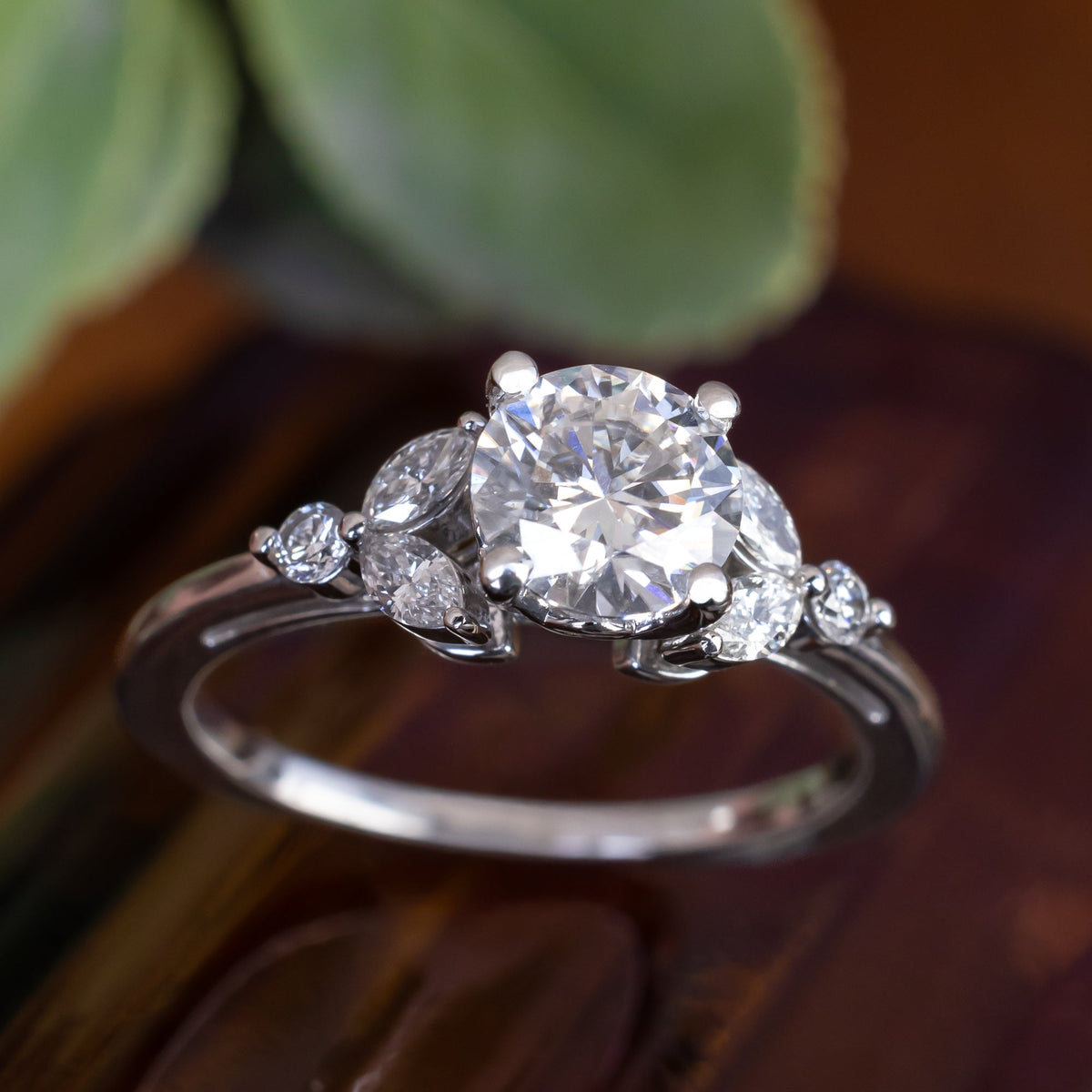 "Blossom" - Round Cut Moissanite Engagement Ring With Diamond Accents
