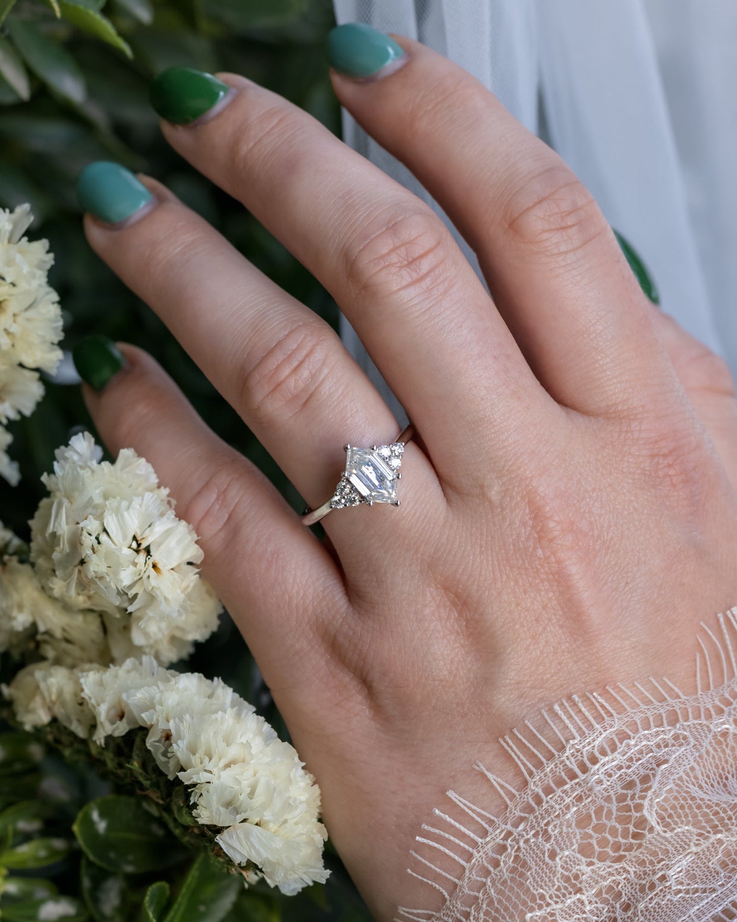 "Octavia" - Elongated Hexagon Cut Moissanite Engagement Ring With Diamond Accents