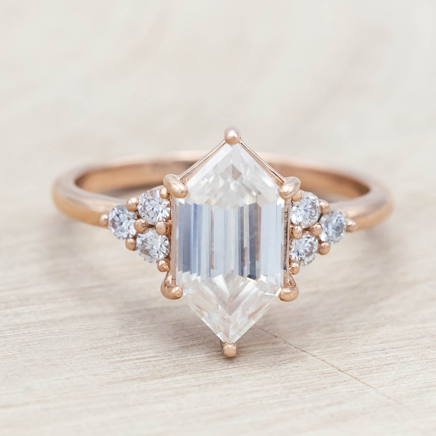 "Octavia" - Elongated Hexagon Cut Moissanite Engagement Ring With Diamond Accents