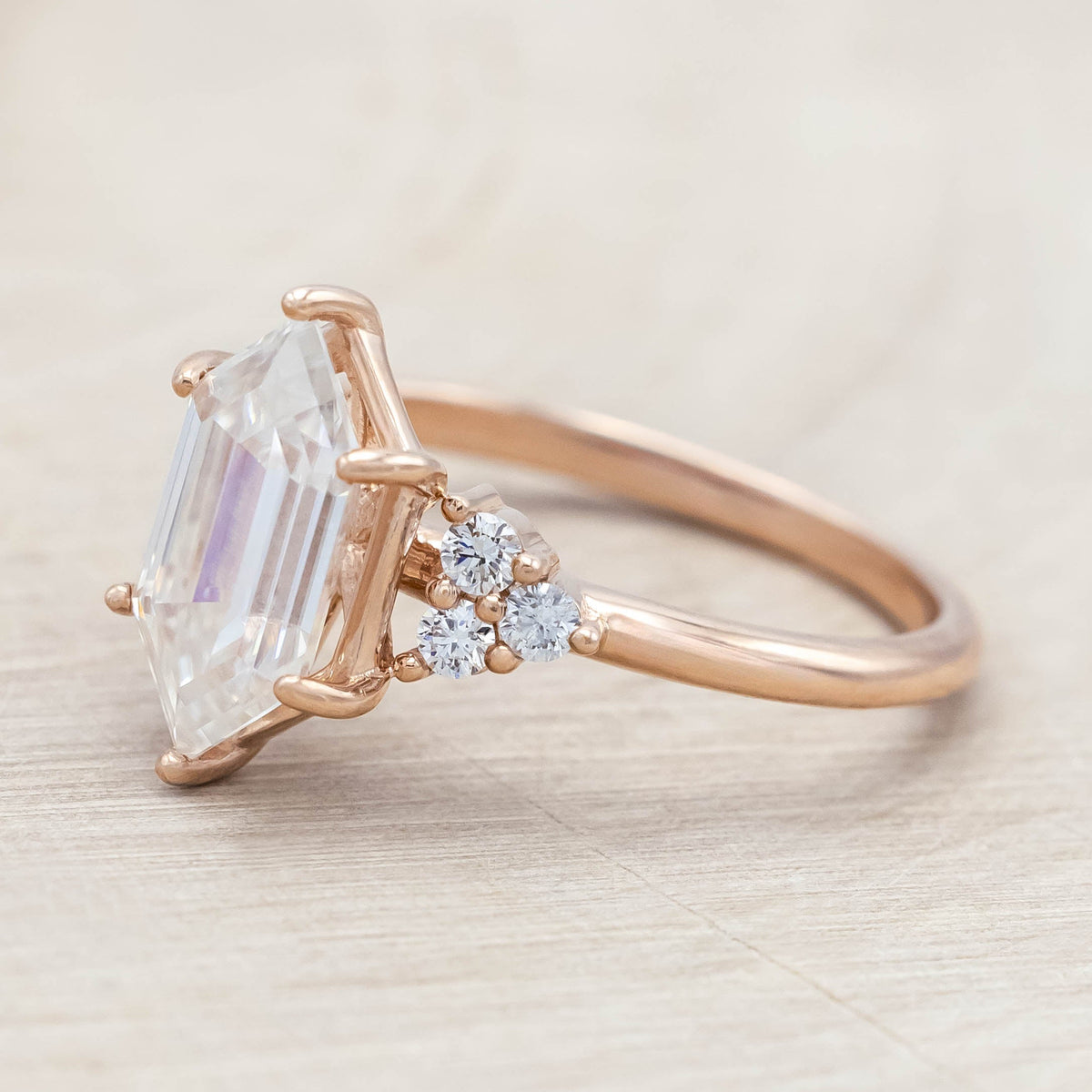 "Octavia" - Elongated Hexagon Cut Moissanite Engagement Ring With Diamond Accents