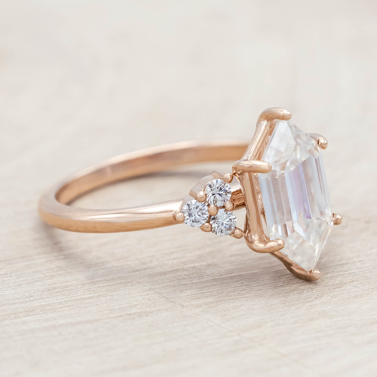 "Octavia" - Elongated Hexagon Cut Moissanite Engagement Ring With Diamond Accents