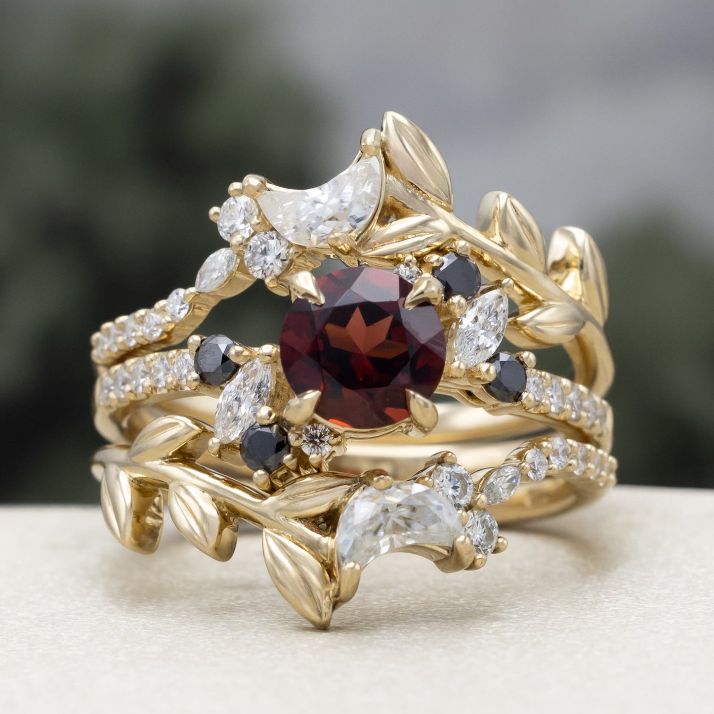 "Demeter" - Bridal Suite - Round Cut Garnet Engagement Ring With Black & White Diamond Accents & Two Diamond Tracers With Crescent Moon Accents