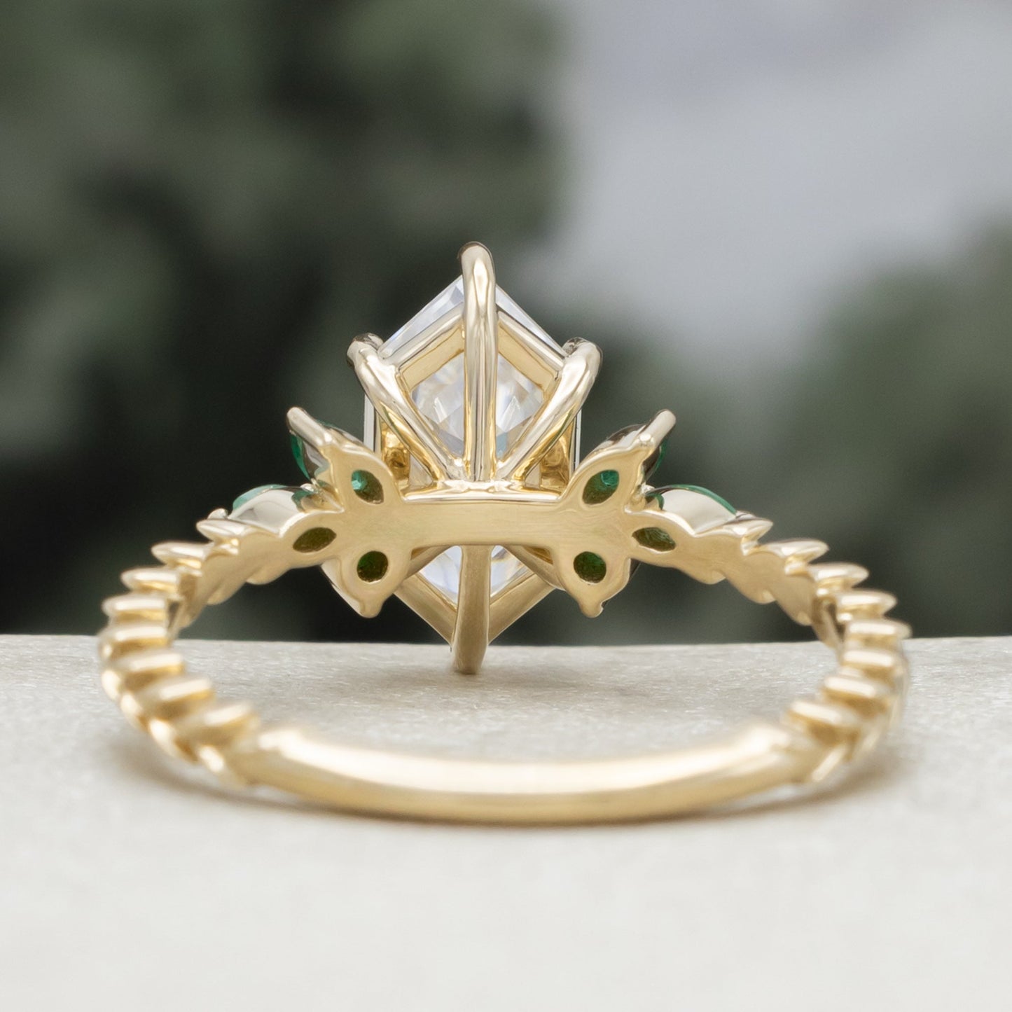 "Laurel" - Elongated Hexagon Moissanite Engagement Ring With Emerald Accents & Wedding Tracer