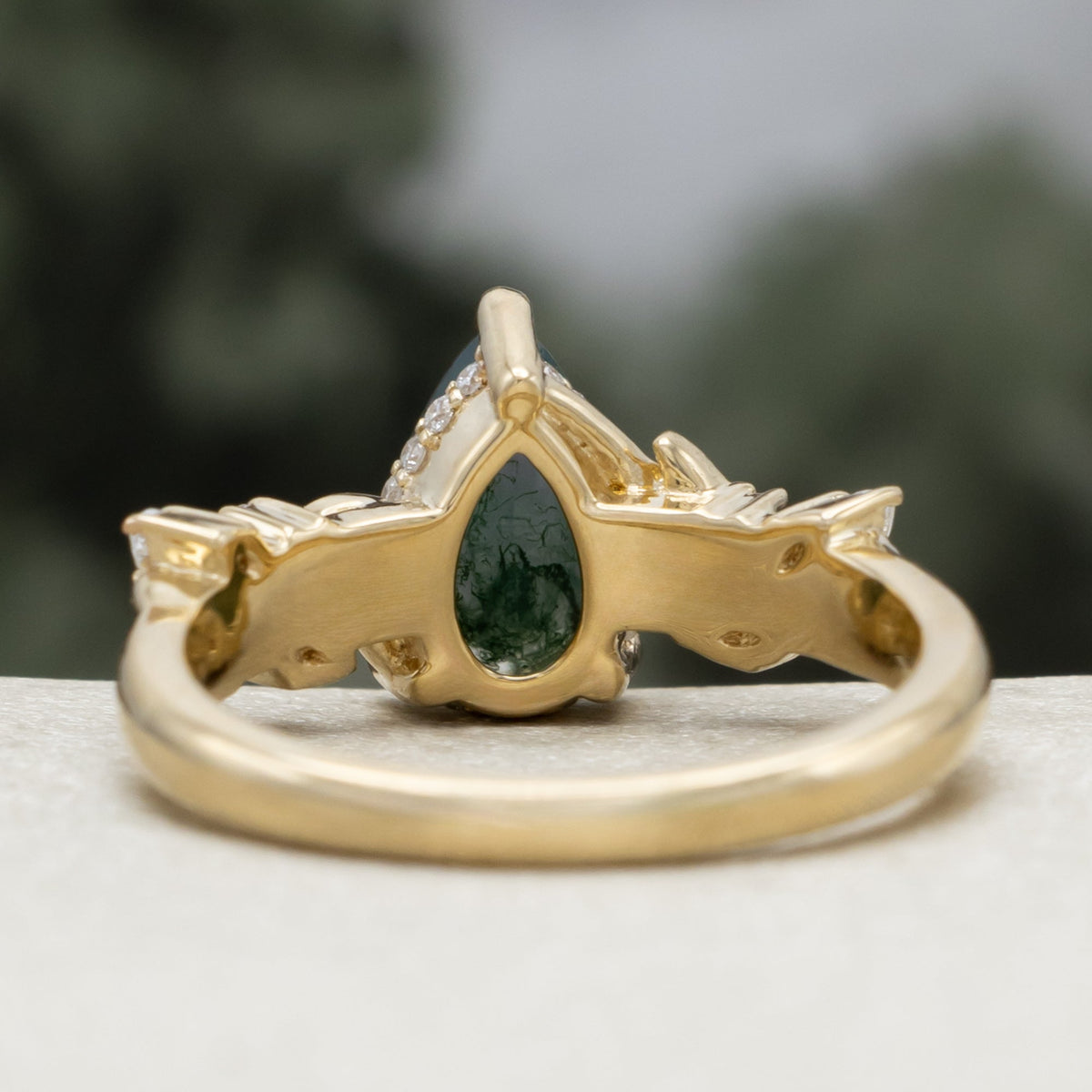 "Catori" - Pear Cut Moss Agate Engagement Ring On A Leaf Style Band With A Hidden Halo
