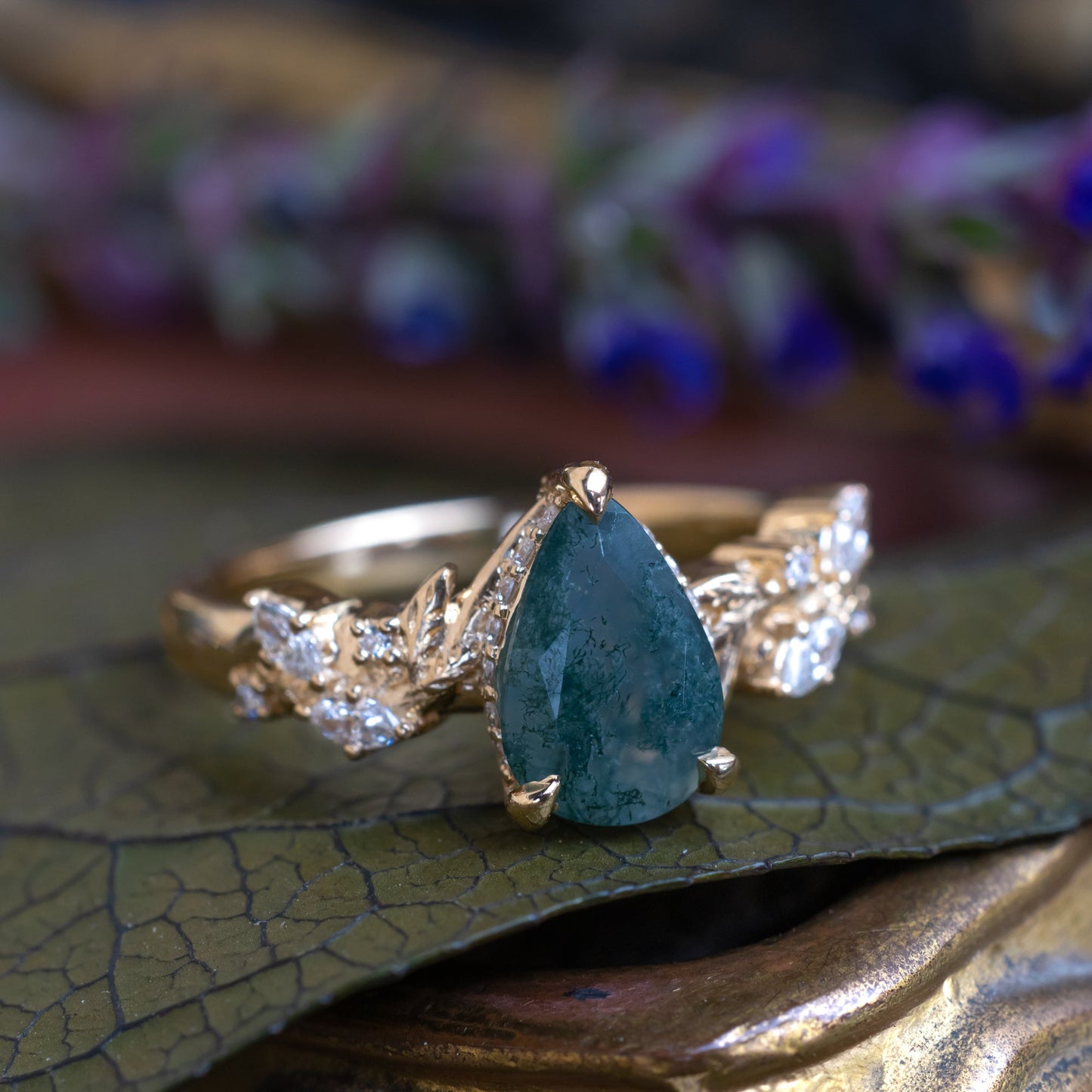 "Catori" - Pear Cut Moss Agate Engagement Ring On A Leaf Style Band With A Hidden Halo
