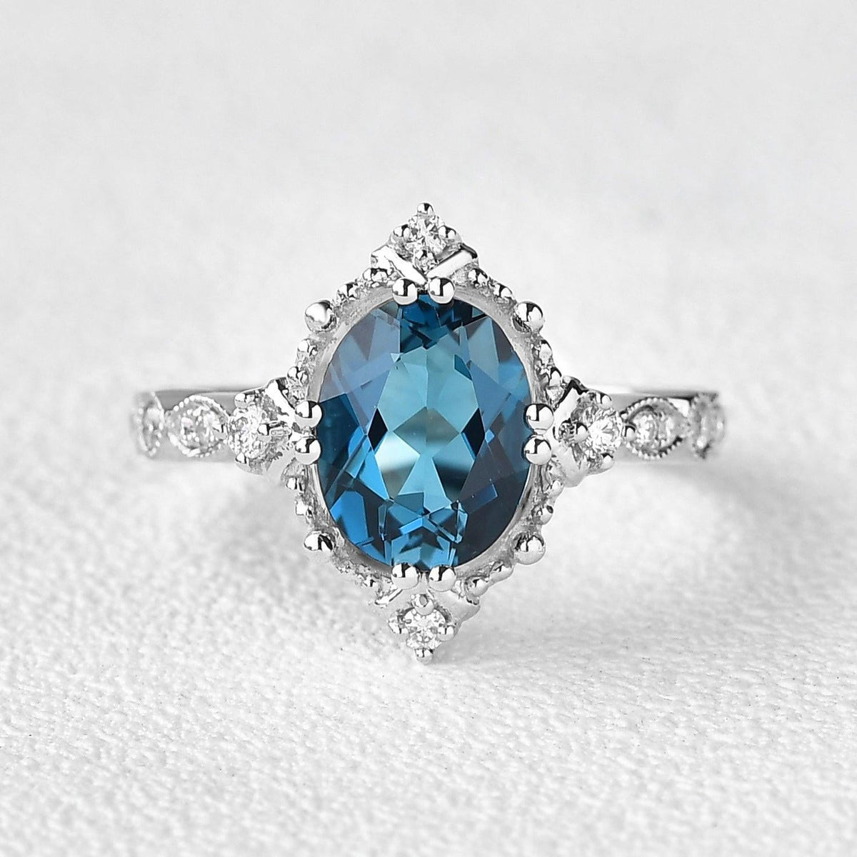 Aurelia’s Luminara | 1.5CT Oval London Blue Topaz & Diamond Art Deco Ring