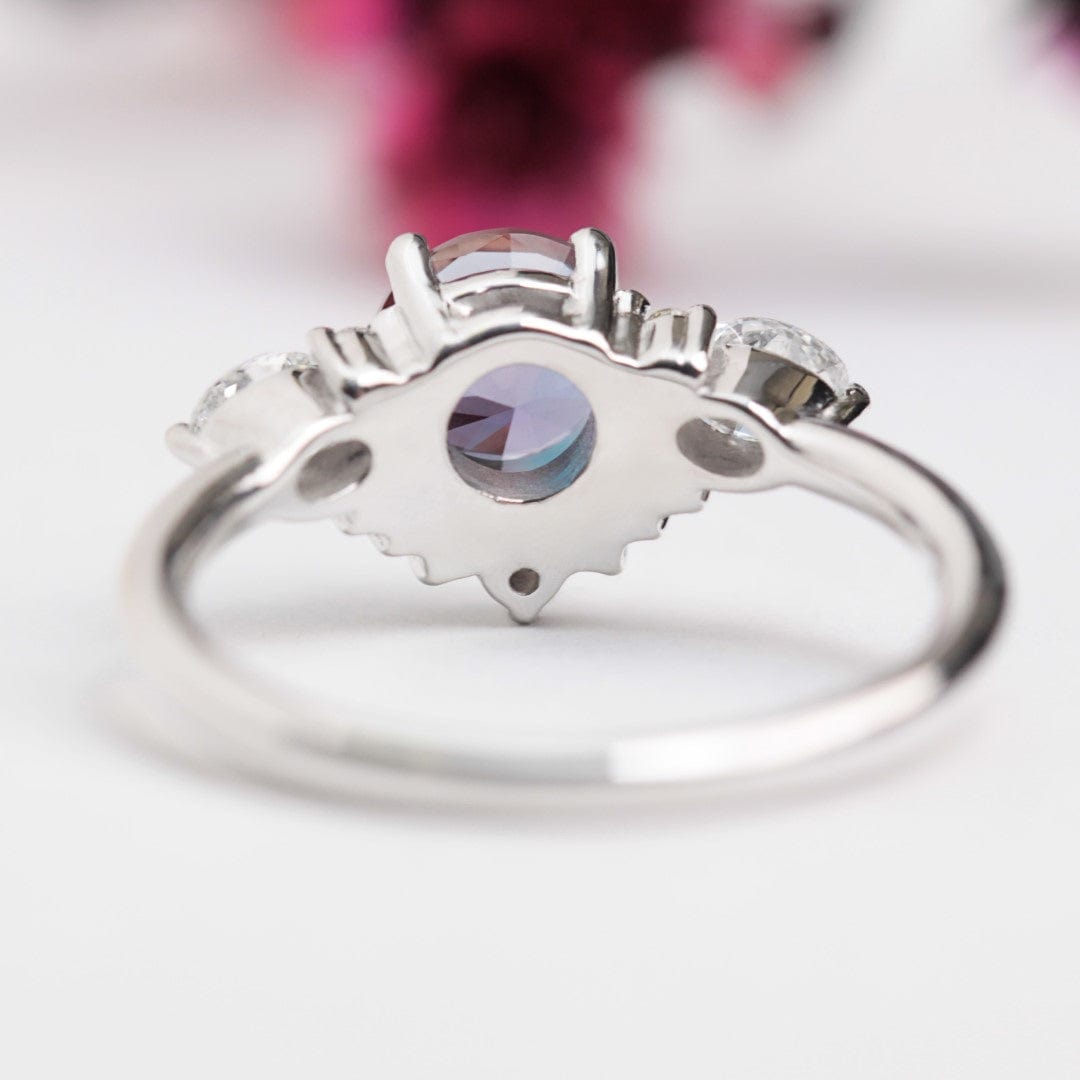 Alexandrite and lab diamond cluster engagement ring