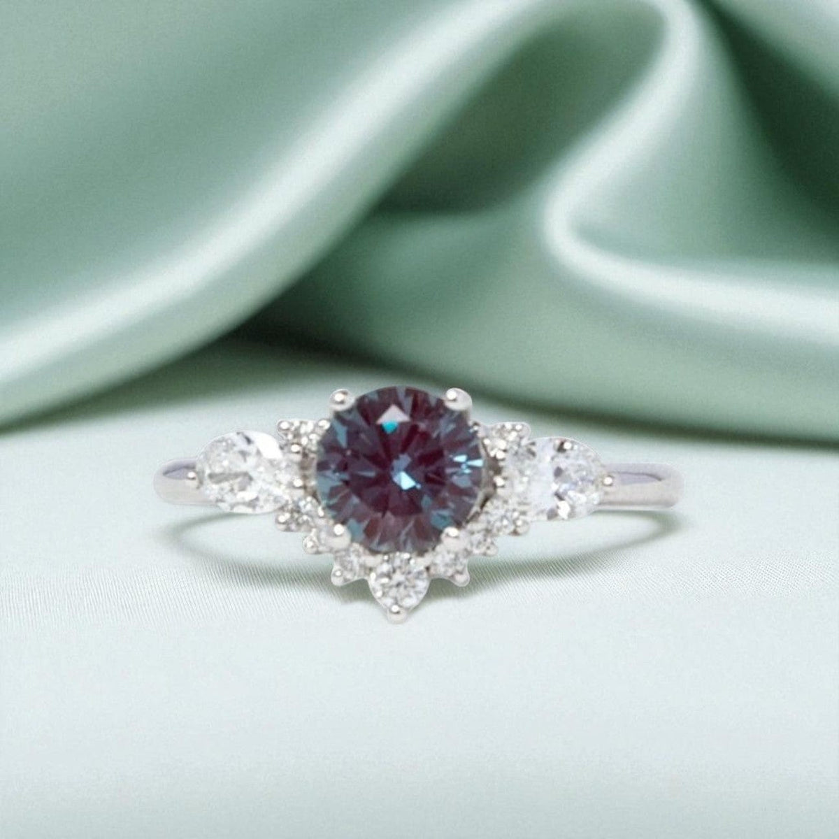 Alexandrite and lab diamond cluster engagement ring