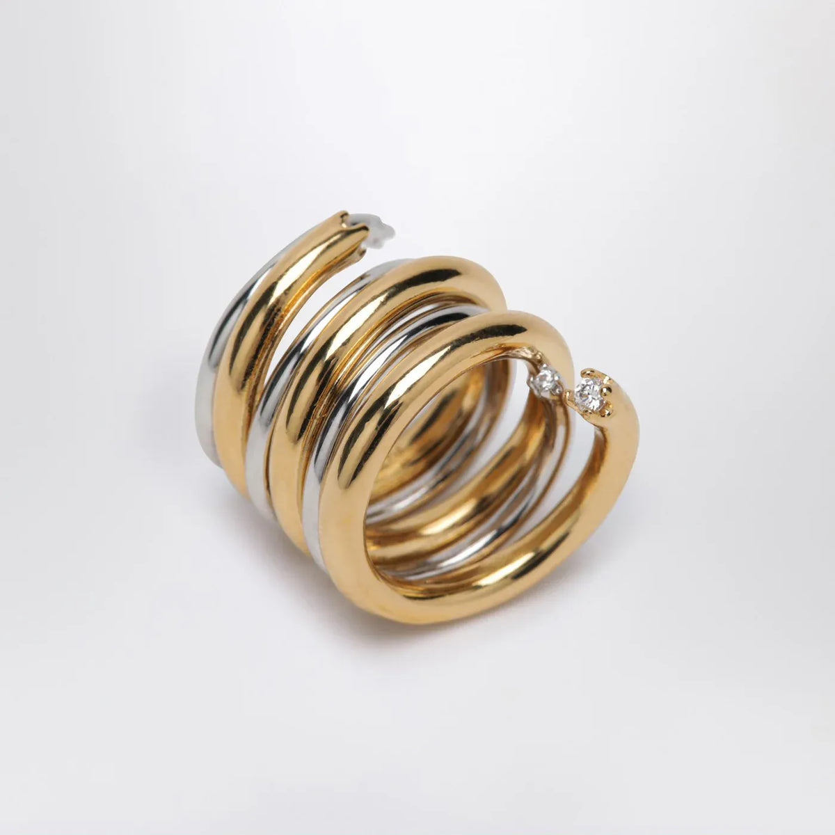 PANCONESI - Spiral ring in gold and silver tone