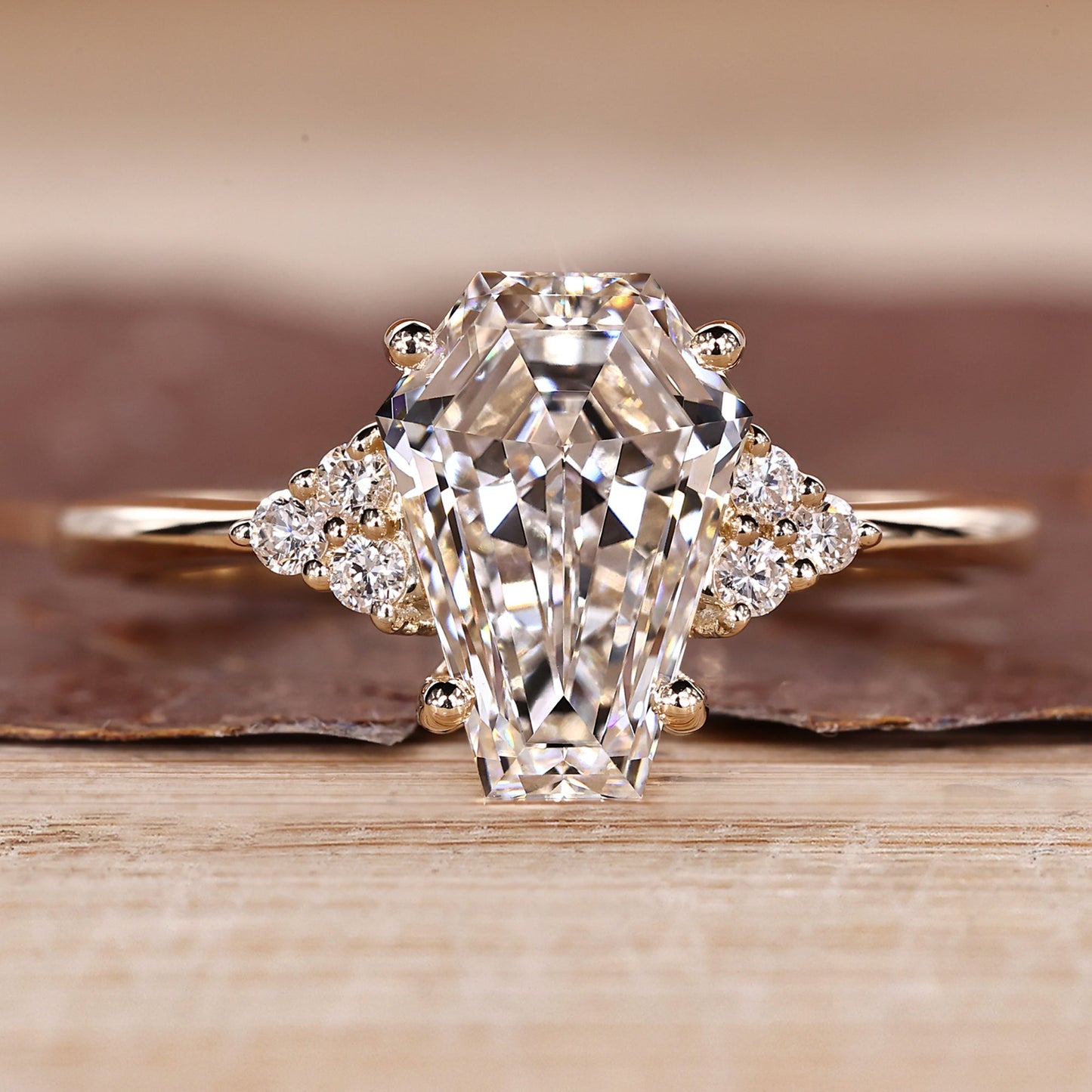 Coffin Cut Diamond Ring with Round Side Stones and Muse Setting