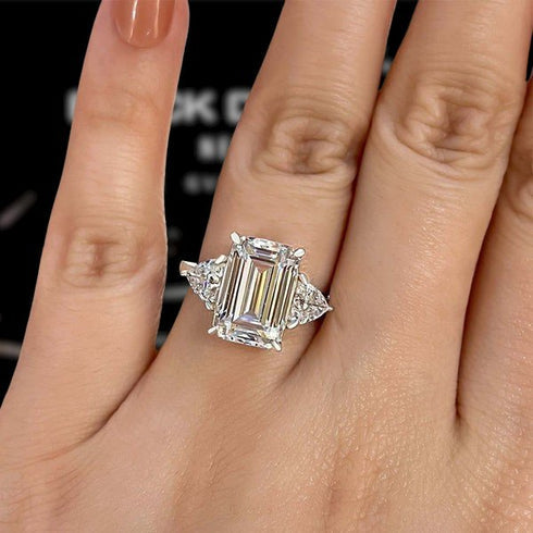Deluxe Emerald Cut 7.5ct Three Stone Engagement Ring In Sterling Silver