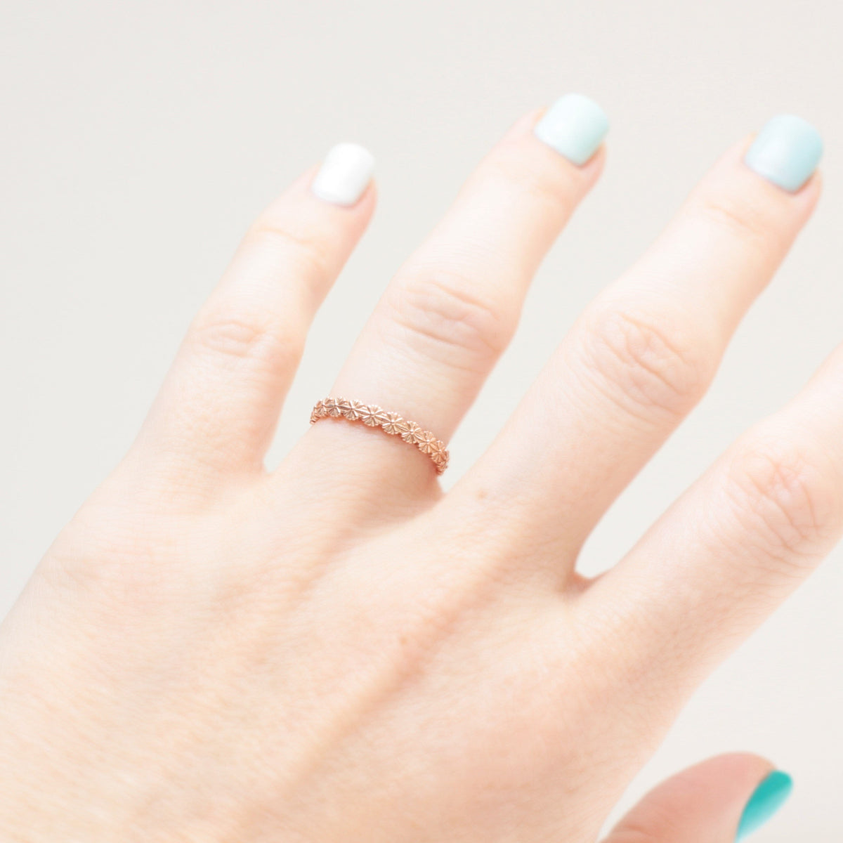 Daisy eternity wedding ring