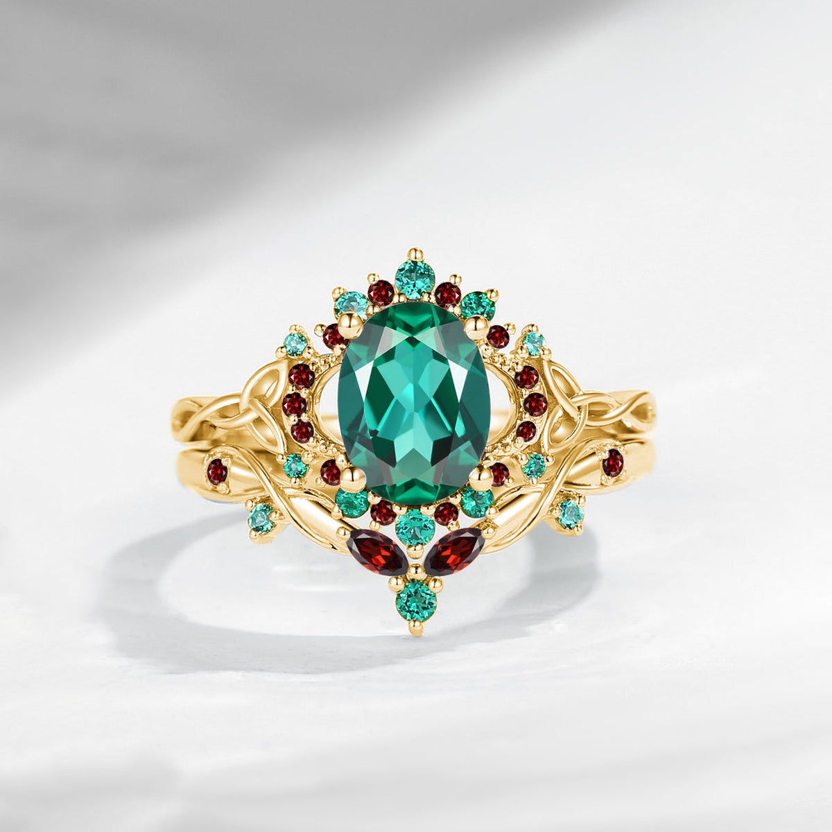 Celtic Moon - Unique Oval Cut Lab Emerald Infinity Celtic Engagement Ring Set