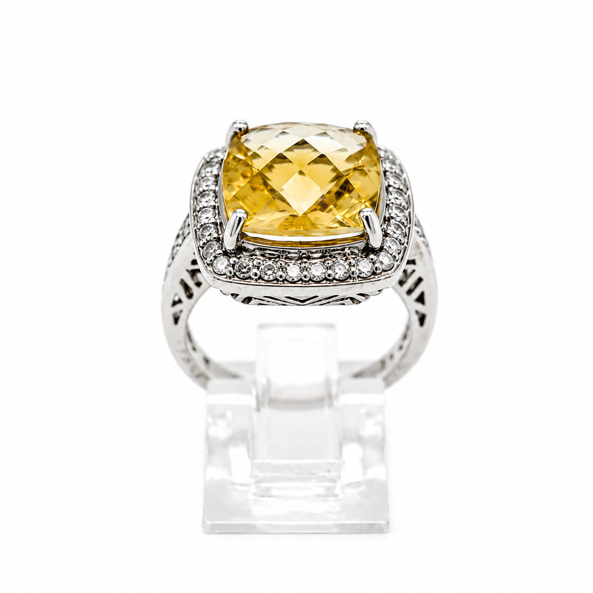 SS Ring with facated orange-yellow stone
