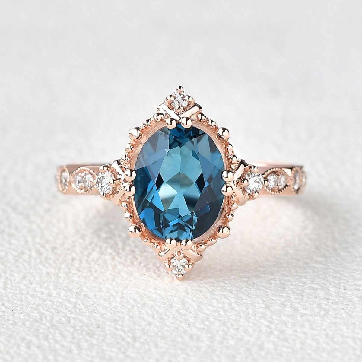 Aurelia’s Luminara | 1.5CT Oval London Blue Topaz & Diamond Art Deco Ring