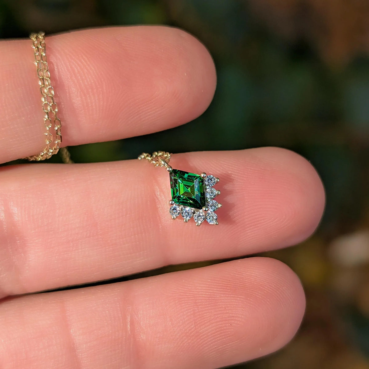 Kite Shaped Emerald Half Halo Pendant Necklace
