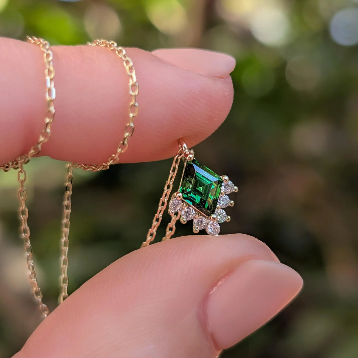 Kite Shaped Emerald Half Halo Pendant Necklace