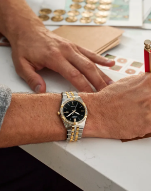 Gent's Two-Tone Citizen Eco-Drive "Corso Diamond" Watch with Black Stick Dial