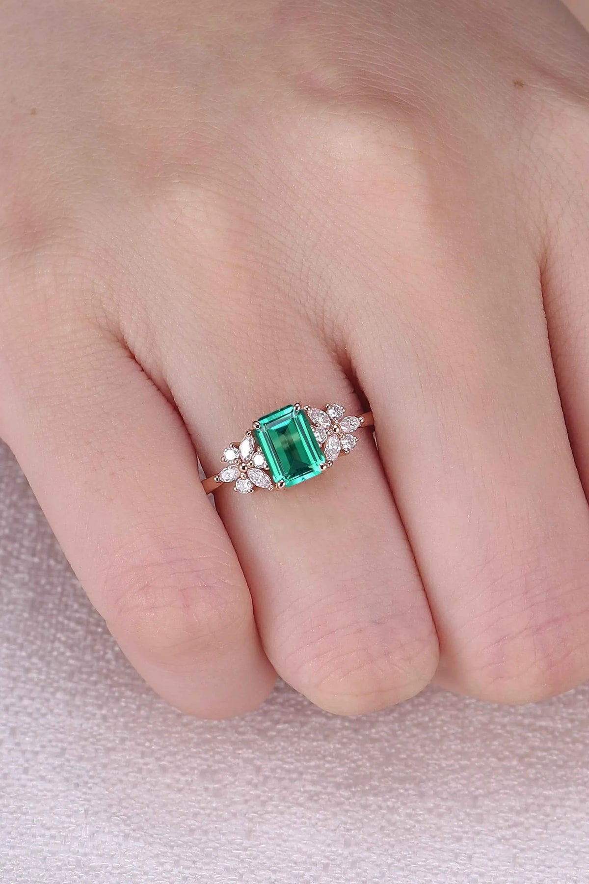 Nature Inspired Emerald Cut Emerald Ring with Petal Moissanite Side Stones