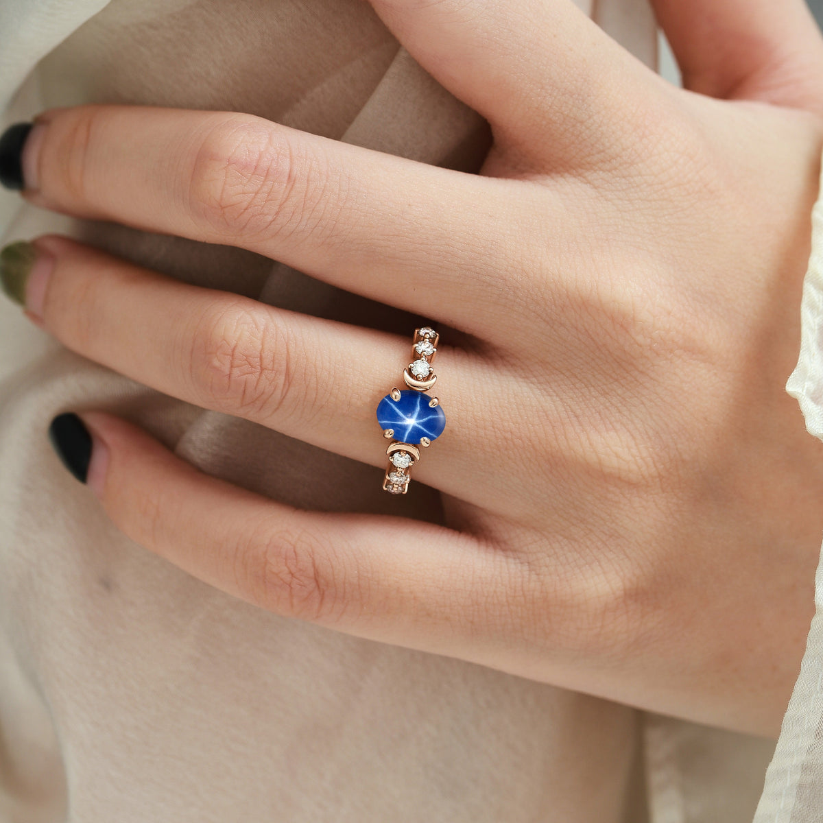 Moon-Inspired Oval Cut Lindy Star Sapphire Engagement Ring with Moissanite Accents