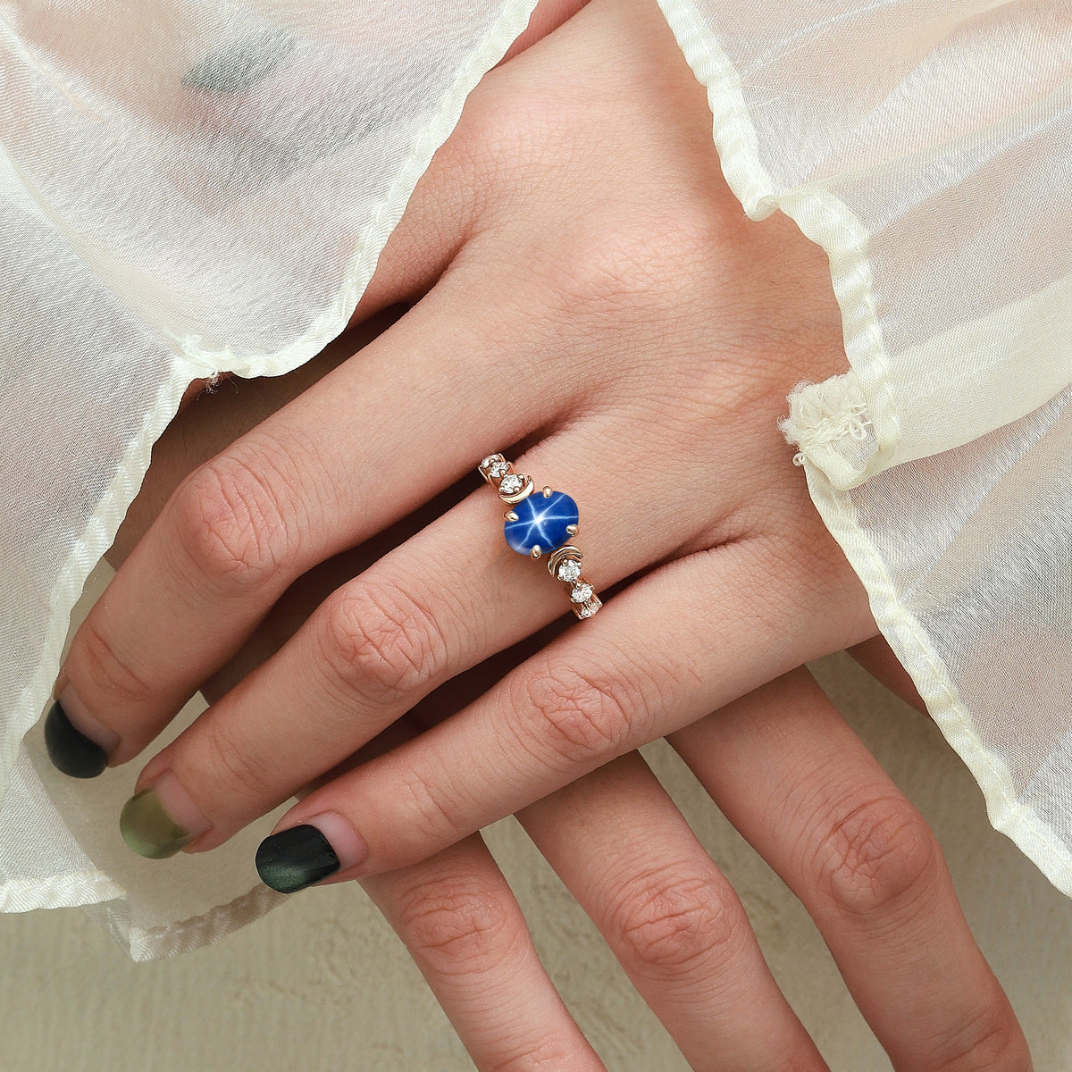 Moon-Inspired Oval Cut Lindy Star Sapphire Engagement Ring with Moissanite Accents
